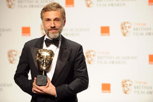 Austrian actor Christoph Waltz poses with his award for Best Supporting Actor in 'Inglourious Basterds' at the British Academy of Film and Television Arts (BAFTA) award ceremony at the Royal Opera House in London, February 21, 2010.