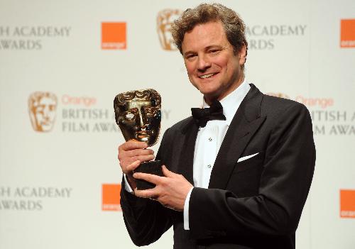 British actor Colin Firth poses with his British Academy of Film Award (BAFTA) for 'Leading actor' for his role in 'A Single Man' at the Royal Opera House in central London.