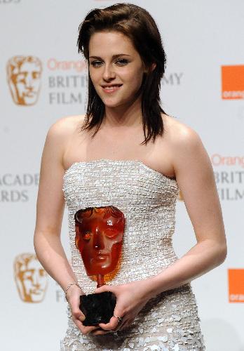 Actress Kristen Stewart holds her Orange Rising Star award at the British Academy of Film and Television Art (BAFTA) awards ceremony at the Royal Opera House in London, February 21, 2010.