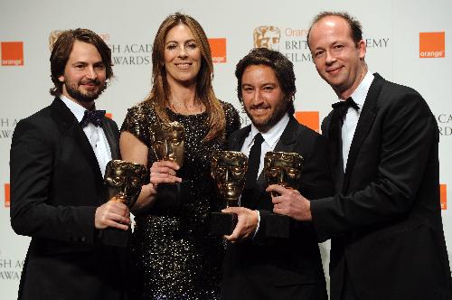 (L-R) Mark Boal, Kathryn Bigelow, Greg Shapiro and Nicholas Chartier pose with their awards for Best Film 'The Hurt Locker' at the British Academy of Film and Television Arts (BAFTA) award ceremony at the Royal Opera House in London February 21, 2010. 