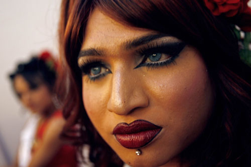 A contestant waits to get her make-up done before the finals of 'Indian Super Queen', a beauty pageant for the transgender community in Mumbai February 21, 2010. Some 400 contestants from the transgender community across the country participated in the pageant.