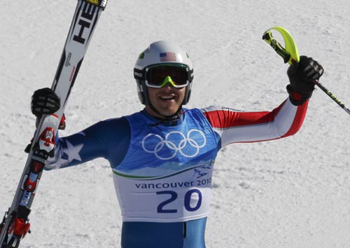 Bode Miller of the U.S. celebrates after crossing the finish line of the Slalom run of the men's Alpine Skiing Super Combined event at the Vancouver 2010 Winter Olympics in Whistler, British Columbia, February 21, 2010. 