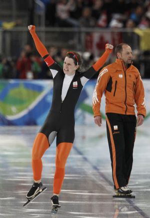Ireen Wust of the Netherlands celebrates after competing in the women's 1500 metres at the Richmond Olympic Oval during the Vancouver 2010 Winter Olympics February 21, 2010. 