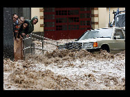 Torrential flash floods and mudslides on the island of Madeira have killed at least 43 and injured 120 people. More than 300 are homeless and the death toll is feared to rise. [Xinhua]