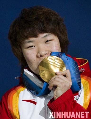 China's newly-crowned Olympic champion Zhou Yang 