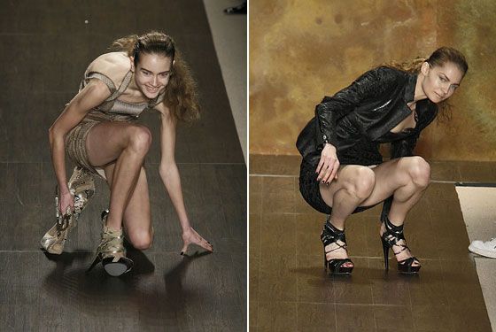 A model falls down on a fashion show because of the dangerous high heels. [China.org.cn]