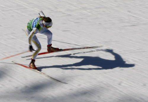 Sweden's Anna Haag skis to finish second in the Team Sprint cross-country final event at the Vancouver 2010 Winter Olympics in Whistler, British Columbia, February 22, 2010. (Xinhua/Reuters Photo)
