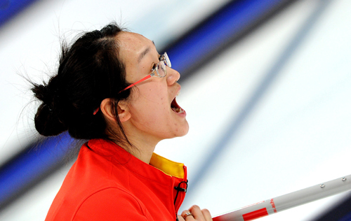 China's Zhou Yan reacts during the women's curling round robin match against Canada at the 2010 Winter Olympic Games in Vancouver, Canada, Feb. 21, 2010. (Xinhua/Chen Kai)