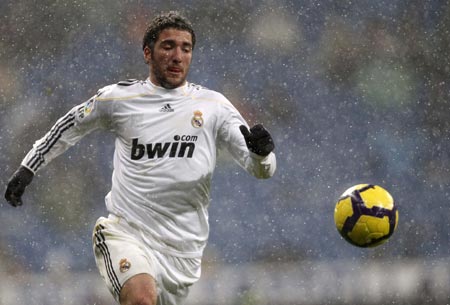 Real Madrid's Gonzalo Higuain looks at the ball during their Spanish First Division soccer match against Real Mallorca at Santiago Bernabeu stadium in Madrid January 10, 2010. (Xinhua/Reuters Photo)