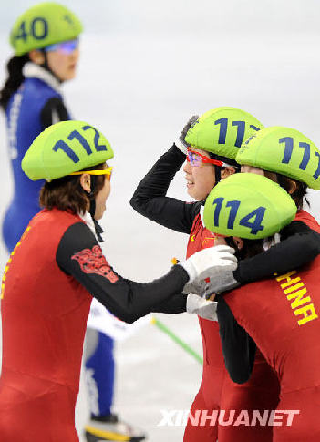 China won the women's 3,000m short track speed skating gold medal with a world record at the Vancouver Olympic Winter Games in Vancouver on Wednesday. China clocked in 4:06.610 for the top honor, Canada got the silver and the United States finished third. South Korea was disqualified in the final.