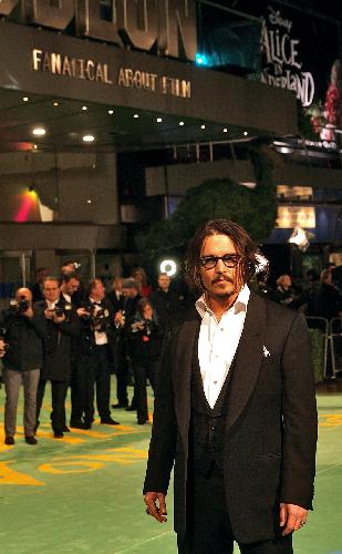 U.S. actor Johnny Depp attends the world premier of 'Alice in Wonderland' at the Odeon Cinema in London's Leicester Square. Depp and Anne Hathaway joined British royalty on Thursday for the London world premiere of Tim Burton's 3D fantasy adventure movie 'Alice in Wonderland'. 