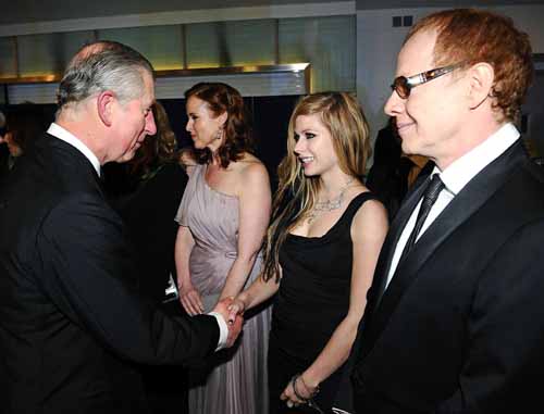 Britain's Prince Charles speaks with singer Avril Lavigne at the Royal World Premiere of 'Alice In Wonderland' in London February 25, 2010.