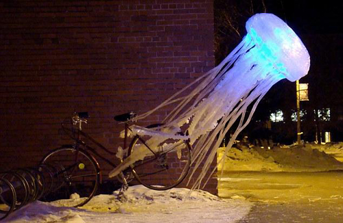 A jellyfish called wonder: This model - called A Strange Way of Going by artist Annie K - shows a giant jellyfish appearing to drag a bike from its rack on a street corner. [CCTV.com]