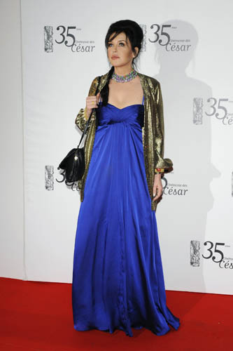 French actress Isabelle Adjani poses as she arrives to attend the Cesar Awards ceremony in Paris February 27, 2010.