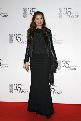 French actress Emmanuelle Devos poses as she arrives to attend the 35th Cesar Awards ceremony in Paris February 27, 2010. 