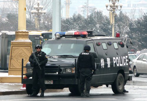SWAT policemen on duty on Beijing's Chang'an Avenue, March 1, 2010. [China Daily]