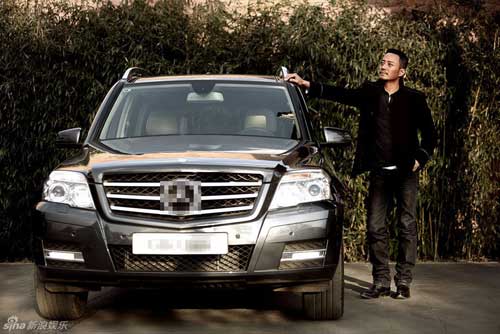 Chinese actor Zhang Hanyu poses for a SUV ad.