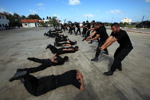 Palestinian Hamas Policemen take part in a training in Gaza city on March 1, 2010. [Wissam Nassar/Xinhua]