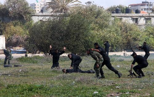 Palestinian Hamas Policemen take part in a training in Gaza city on March 1, 2010. [Wissam Nassar/Xinhua]