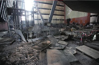  This photo released on Tuesday shows the wrecked inside of the China Central Television HQ after the building caught fire due to the wrong display of firework in February of 2009. [Caijing Magazine] 