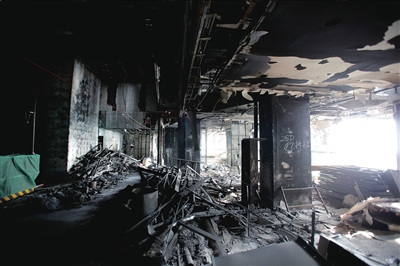  This photo released on Tuesday shows the wrecked inside of the China Central Television HQ after the building caught fire due to the wrong display of firework in February of 2009. [Caijing Magazine] 