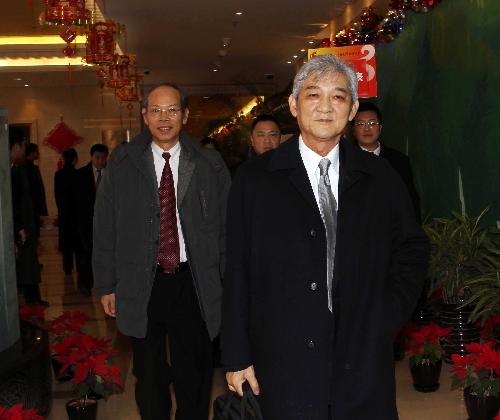 Deputies to the Third Session of the 11th National People's Congress (NPC) from south China's Macao Special Administrative Region (SAR) arrive in Beijing, capital of China, March 2, 2010. The Third Session of the 11th NPC is scheduled to open on March 5. [Liu Weibinga/Xinhua]