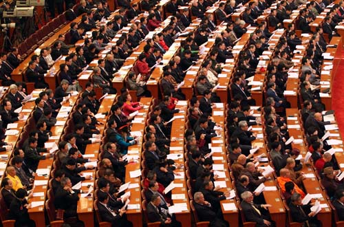 Members of the 11th National Committee of the Chinese People's Political Consultative Conference (CPPCC) attend the opening meeting of the Third Session of the 11th CPPCC National Committee at the Great Hall of the People in Beijing, capital of China, March 3, 2010. 