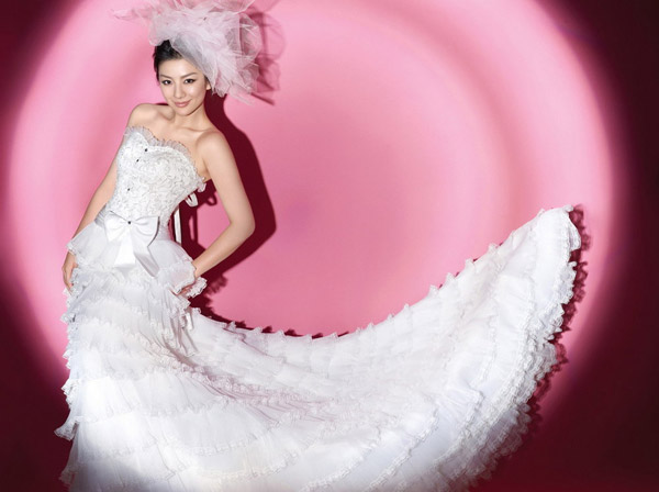 Chinese actress Huang Yi poses for a photo spread that is featured in the magazine 'Modern Bride'. 