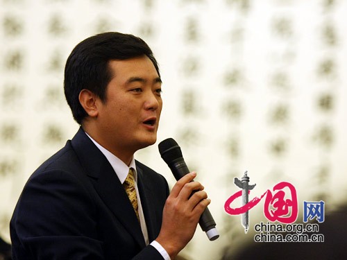 The Press Conference of the 3rd session of the 11th National People's Congress (NPC) is held at 11:00 AM, March 4th, 2010 at the Central Hall of the Great Hall of People. A journalist from CCTV is asking questions.