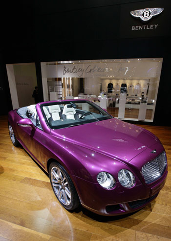 A Bentley Continental GT is shown at the exhibition stand of Bentley during the second media day of the 80th Geneva Car Show at the Palexpo in Geneva March 3, 2010. [Xinhua/Reuters]