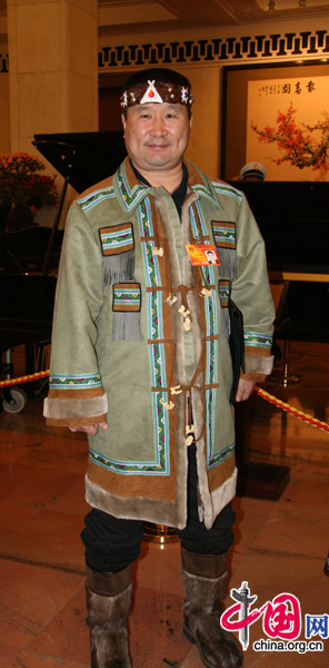 An NPC deputy from the Evenki people, one of China&apos;s 56 ethnic groups, attends the National People&apos;s Congress at the Great Hall of the People in Beijing, March 5, 2010. [Li Shen/China.org.cn]