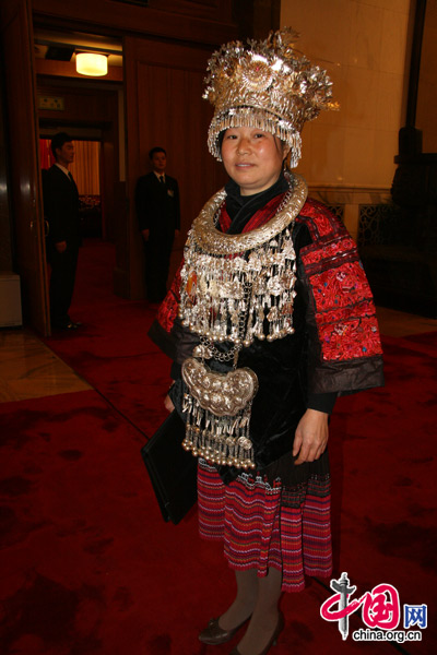 An NPC deputy from the Miao people, one of China&apos;s 56 ethnic groups, attends the National People&apos;s Congress (NPC) at the Great Hall of the People in Beijing, March 5, 2010. [Li Shen/China.org.cn]