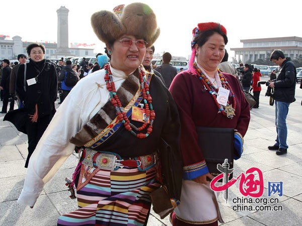 The 11th National People's Congress (NPC), the top legislature of China, starts its third session at the Great Hall of the People in Beijing at 9 a.m. Friday. NPC deputies from ethnic minority groups attend the opening meeting.