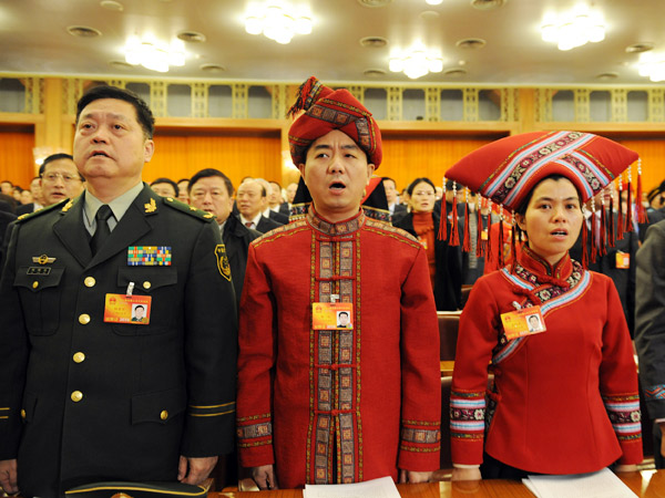 The 11th National People's Congress (NPC), the top legislature of China, starts its third session at the Great Hall of the People in Beijing at 9 a.m. Friday. NPC deputies attend the opening meeting.