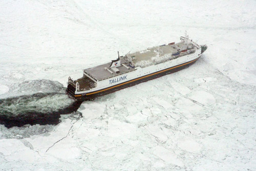 A handout photo released by the Swedish Coast Guard shows a large cargo ship stuck in the ice in the Baltic Sea. [Xinhua/AFP]