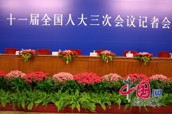 Senior officials with the National Development and Reform Commission, the Ministry of Finance, the Ministry of Commerce and the central bank hold a press conference on macroeconomic regulation and control in Beijing, March 6, 2010. 