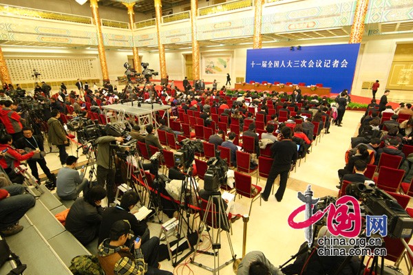 Senior officials with the National Development and Reform Commission, the Ministry of Finance, the Ministry of Commerce and the central bank hold a press conference on macroeconomic regulation and control in Beijing, March 6, 2010. 