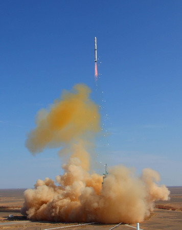 This photo shows the remote-sensing satellite 'Yaogan IX' was put into orbit by a Long March 4C carrier rocket from the Jiuquan Satellite Launch Center in northwestern Gansu province at 12:55 pm Friday. [Xinhua]