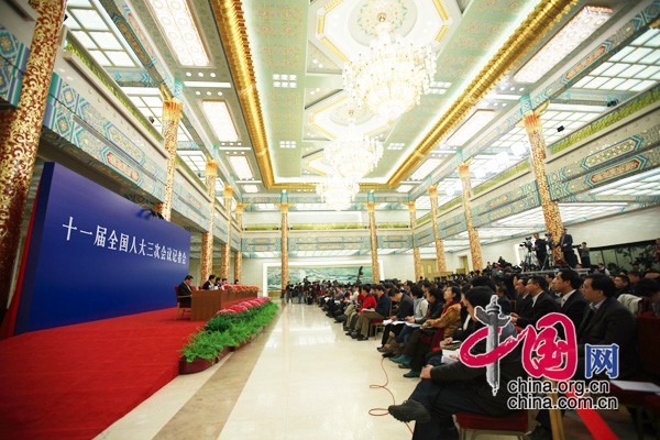 Senior officials with the National Development and Reform Commission, the Ministry of Finance, the Ministry of Commerce and the central bank hold a press conference on macroeconomic regulation and control in Beijing, March 6, 2010.