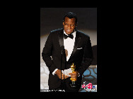 Screenwriter Geoffrey Fletcher accepts Best Adapted Screenplay award for 'Precious: Based on the Novel 'Push' by Sapphire' award onstage during the 82nd Annual Academy Awards held at Kodak Theatre on March 7, 2010 in Hollywood, California. [CFP]