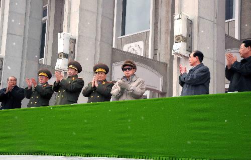 Kim Jong Il (C), top leader of the Democratic People&apos;s Republic of Korea (DPRK), attends a mass meeting at the February 8 vinalon production complex in North Hamgyong province, DPRK, on March 6, 2010, in this picture released by DPRK&apos;s official news agency KCNA on March 7, 2010. [Xinhua]