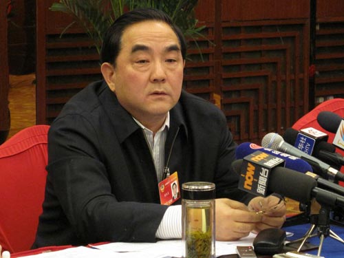 Yang Kaisheng, president of Industrial and Commercial Bank of China, is speaking at a press conference in Beijing on Sunday, March 7, 2010. [CRI]