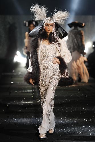 A model wears a creation by British fashion designer John Galliano as part of his ready-to-wear fashion collection 2010, presented in Paris, Sunday March. 7, 2010.
