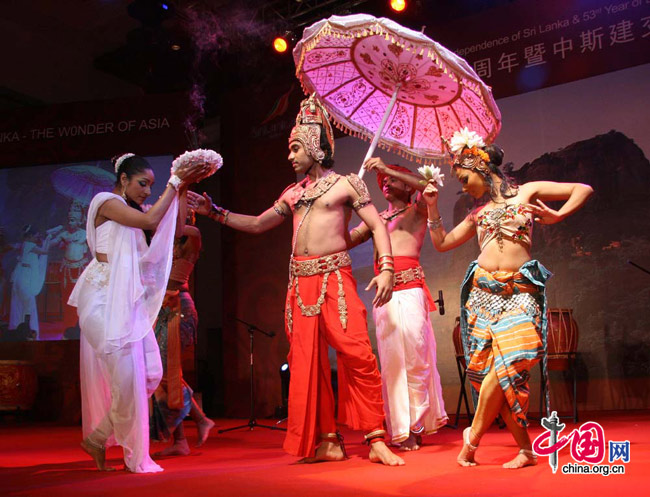 Dancers perform in celebration of the 62nd Anniversary of the Independence of Sri Lanka and the 53rd year of diplomatic relations between Sri Lanka and China on March 5, 2010. [Celine Chen/China.org.cn]