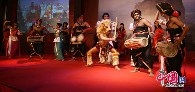 Dancers and drummers perform at &apos;Sri Lanka-the Wonder of Asia,&apos; a cultural event commemorating the 62nd Anniversary of the Independence of Sri Lanka and the 53rd year of diplomatic relations between Sri Lanka and China on March 5, 2010. [Celine Chen/China.org.cn]