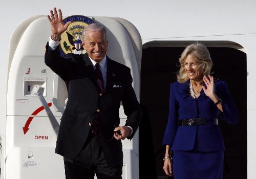 U.S. Vice President Joe Biden (L) and his wife Dr. Jill Biden gesture upon their arrival at the Ben Gurion airport, near Tel Aviv, Israel, March 8, 2010.