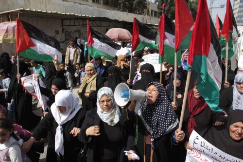 Palestinian women chant anti-Israel slogans during a demonstration in Rafah, southern Gaza Strip on March 8, 2010. [Khaled Omar/Xinhua]