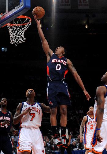 Jeff Teague (Above) of Atlanta Hawks goes to the basket during the NBA game between New York Knicks and Atlanta Hawks in New York, the United States, March 8, 2010. Knicks won 99-98. (Xinhua/Shen Hong)