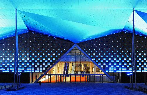 Photo taken on March 7, 2010 shows the illuminated theme pavilion at Shanghai Expo park during the light debugging, in Shanghai, east China. [Xinhua/Guo Changyao] 