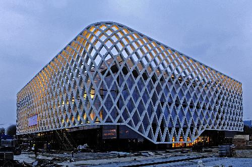 Photo taken on March 7, 2010 shows the illuminated France pavilion at Shanghai Expo park during the light debugging, in Shanghai, east China. [Xinhua/Guo Changyao]